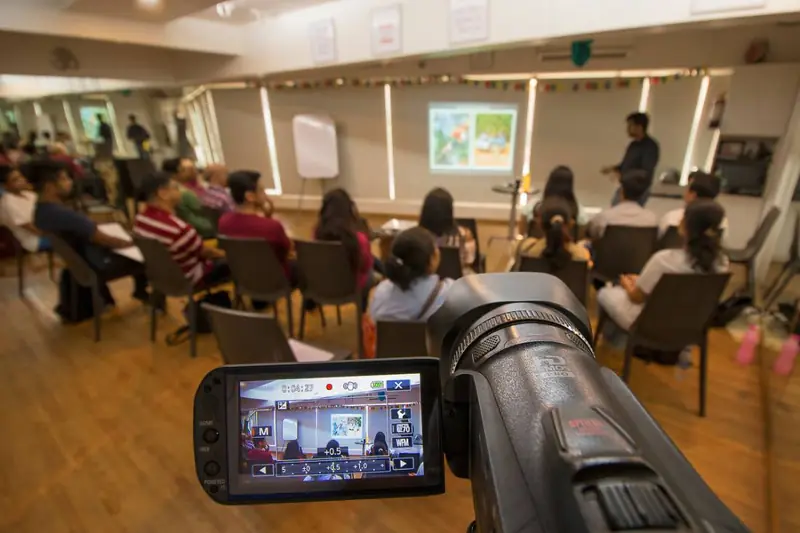 Attendees reviewing their shots during the workshop